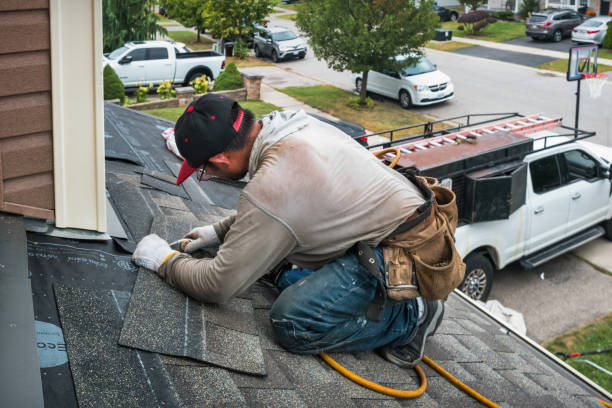Professional Gutter Repair And Installation technician working in Manchester, NH